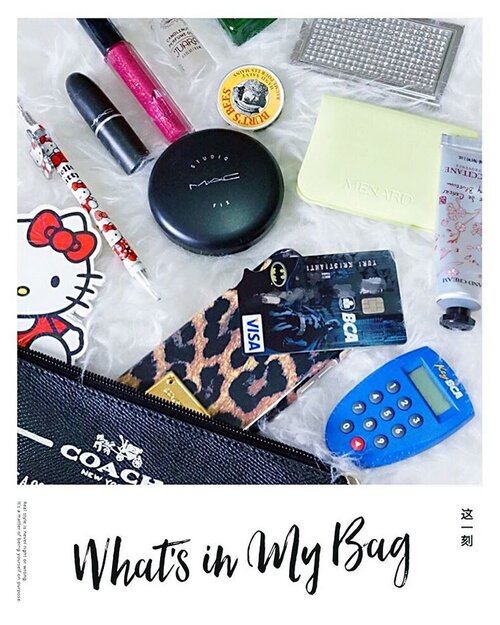 The close-up view of #whatsinmybag for #InovasiBCA #apaisitasku
.
My daily essentials usually include these things :
🔹Notes + Bulpen Hello Kitty (saya hampir selalu bawa notes kecil gini, siapa tau perlu untuk nyatet sesuatu).
🔹Mobile Phone (ini mah harus banget wajib kudu dibawa 😙).
🔹Kartu ATM & Creditcard BCA (Selain bawa cash juga harus selalu bawa kartu debit dan credit card. Ini penting untuk keperluan belanja / beli sesuatu, dana darurat, atau pun memanfaatkan promo diskon dari kartu kredit).
🔹Key BCA (jaman sekarang harus punya key BCA karena praktis banget kalau mau transfer dana, bayar kartu kredit, cek saldo, dan lain lain tanpa harus pergi ke bank / atm).
🔹Bedak + Lipstick/Lipgloss (siapa tau perlu touch up atau harus lanjut ketemu orang untuk urusan kerjaan).
🔹Parfum roll-on (obat pede 😉 Pilih yang mini atau bentuknya roll on karena praktis).
🔹Anti Bacterial Hand Gel (berhubung saya orangnya takut kuman).
🔹Balm / Hand Lotion (karena tangan saya suka terasa kering kena AC mobil).
🔹Blotting Paper (untuk hapus kilang minyak di wajah ;p).
🔹Tissue (udah pasti harus banget dibawa).
🔹Business Card Holder (untuk bawa kartu nama blog).
🔹Kartu identitas + uang cash (not photographed).
__
#InovasiBCA #apaisitasku 
__
Sekian & terima kasih 😊
.................
#whatsinmybag #todaysbag #myessentials #botd #bagessentials #coachgirl #bloggerlife #mybag #indonesianblogger #starclozetter #clozetteid