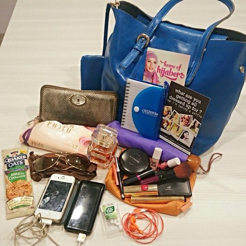 What's inside my bag! Can not live without my parfume, headset, cellphone, powerbank, make up, and healthy snacks #clozetteID #AcerLiquidJade #clozette #insidemybag #bag #fossil #benefit #mac #loreal #iphonesia #instawork #instadaily