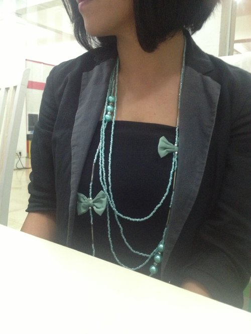 Steal the Deal. A best finding at Brightspot Market, discounted teal ribbon necklace.