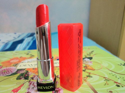 Revlon lipbutter in Tutti frutti. Very moiturizing and doesnt dry my lip. it glides smoothly on my lip.  I can use 1-2 layer to give sheer natural color for everyday use or more layer to get bold colour. Repurchase? Definitely!