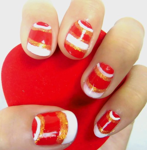 Red with gold glamour nail art 