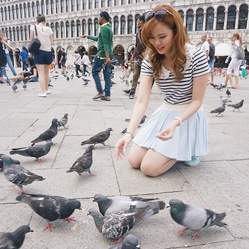 Yesterday, I visited St. Mark Square at Venice Island. My family and I decided not to ride the gondola because we thought it was quite expensive, about 150 euros per boat. And the view, according to my mom was not worth it. Instead, I enjoyed my first experience feeding pigeons. The pigeons weren't afraid of people. If you stay still and throw food at them, they'll flock around you and eat from your hands.

#TravelWithJeanMilka #pigeons #venice #stmark #italy #travel #holiday #GGRep #ClozetteId
