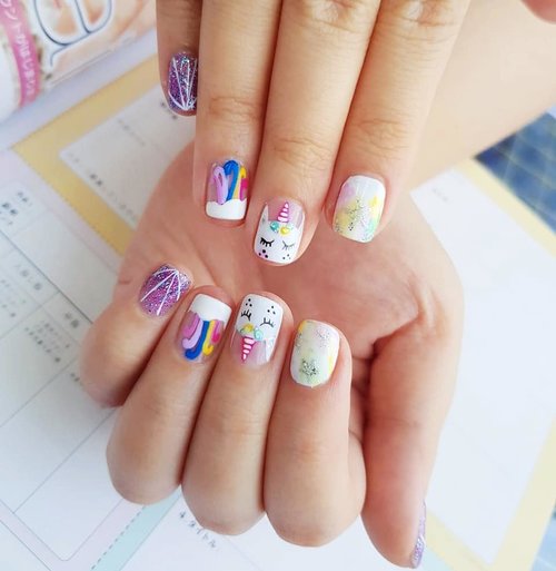 My uber kawaii Unicorn Nails for summer holiday trip,  thank you @menail.salon !

I actually found the design randomly on IG and showed them the photo then they were able to recreate the design perfectly,  so if you ever have a dream design you can snap a pic and ask them to make it for you! 
#unicornlife
#unicorn🦄 #unicornnails 
#nails #nailart #gelnailart #gelnails #gelnaildesign #menail #blogger #bblogger #bloggerid #clozetteid #beautynesiamember #sbybeautyblogger #endorse #sponsored #endorsersby #endorsement #endorsementid #endorsementsby #influencer #beautyinfluencer #surabayainfluencer #beautyblogger #indonesianblogger #surabayablogger #nailstagram #instana