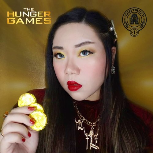 New collab with my talented friends, this time the theme is a little bit out of my comfort zone : the Hunger Games.

I mean, i watched all the movies but that's about all (i don't even remember any of the districts), i am not particularly attached to the series and have no emotional bond to it, that's why i chose the District that i thought would be the easiest : District 1, Luxury 💰💰💰 haha. I love having these collabs so much, i love the concepting, the planning, the prop shopping (i only bought the gold chocolate coins for this collab), the actual makeup - it's so much fun and force me to be more creative and imaginative.

Check out my friends' looks for the other districts coz they are all AMAZING!

#clozetteid #hungergamescollab #hungergamesmakeupcollab
#district1 #luxury #BeauteFemmeCommunity  #thematiclook #thematicmakeup 
#sbybeautyblogger #makeup #ilovemakeup #clozetteid #sbybeautyblogger #bloggerceria
#beautynesiamember #bloggerperempuan #indonesianfemalebloggers #girl #asian  #bblogger #bbloggerid #influencer #influencersurabaya #influencerindonesia #beautyinfluencer #surabayainfluencer #jakartabeautyblogger #SURABAYABEAUTYBLOGGER #makeuplook #beautysocietyid