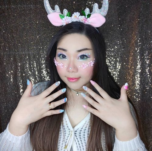 My nails by @menail.salon 's also created to support this look, i asked for pastel colored, wintry Christmas nails.

And for those who are still asking,  the contact lenses are Ice no 8 in Grey, i use it in all of my kawaii makeups 😭 .

#clozetteid #deermakeup #pastelmakeup #christmasmakeup
 #BeauteFemmeCommunity  #thematiclook #thematicmakeup 
#sbybeautyblogger #makeup #ilovemakeup #clozetteid #sbybeautyblogger #bloggerceria
#beautynesiamember #bloggerperempuan #indonesianfemalebloggers #girl #asian  #bblogger #bbloggerid #influencer #influencersurabaya #influencerindonesia #beautyinfluencer #surabayainfluencer #jakartabeautyblogger #SURABAYABEAUTYBLOGGER #makeuplook #socobeautynetwork #startwithsbn