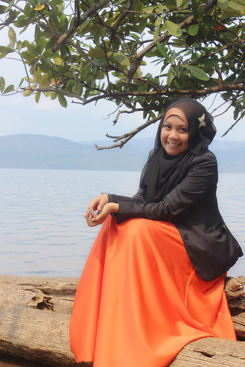 Mix orange dress, black blazer and black hijab!  at Ide Beach, Soroako