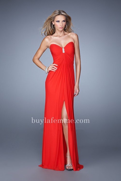 Look instantly glamorous in La Femme 21233. This glamorous evening gown features a strapless and structured sweetheart neckline. Glittering brooch adorns the shirred bodice at center front, with the crisscross open back creates an boldly eye-catching silhouette. Perfect for 2015 Prom Dress, Homecoming Dress, Holiday Dress, Winter Formal Dress, or Special Occasion Dress. Size: Standard Size or Custom Made SizeClosure: Side ZipperDetails: Beaded Detail, Open Back, Side SlitFabric: Net JerseyLength: LongNeckline: Strapless SweetheartWaistline: NaturalColor: RedTag: Red, Long, Strapless Sweetheart, Side Slit, Prom Dresses, La Femme 21233