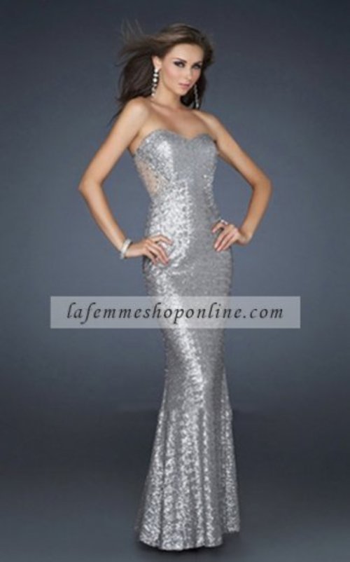 This gown is fully sequined in an intricate pattern. The bodice is sweetheart and strapless. This sheath gown has a slim mermaid skirt. This is a long prom dress. The back is very low and sheer with beads and jewel details. Wear this sexy style to a red carpet event!Size: Standard Size or Custom Made SizeClosure: Side ZipperLength: Floor LengthNeckline: Strapless SweetheartWaistline: NaturalDetails: Sheer Back Accented with Beads, Mermaid skirtFabric: ChiffonColor:SilverTag: Silver,Sequin,Open back,Strapless,Long,Homecoming Dress