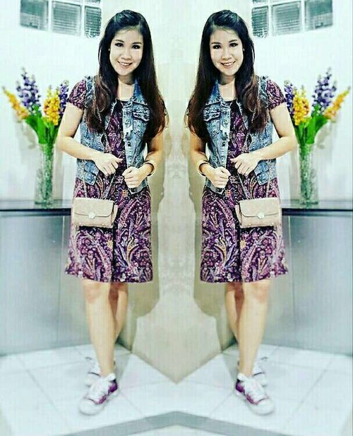 you can combine batik dress with denim vest for a casual look.....mini sling bag will be cute for this outfit