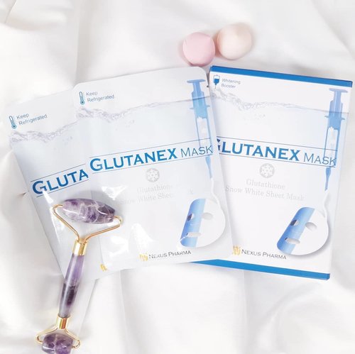 #glutanexgiftedme @glutanex.official their products. I got 3 products, they are mask, night serum, snow white cream for day time.
Now i want to review about Glutanex Snow White Mask ✨
~~
Glutanex mask was engineered to reveal a brighter and more radiant skin. This mask promotes whitening, hydration, nourishment and skin clarity to help achieve the dazzling look in just 15 minutes. It suggested to keep refrigerated to get full snow white effect
This mask made from cupra sheets, cupra sheets are made from pure natural cotton and maintain all serum perfectly for the skin. The fit was perfect for my face and look transparent.
~~
The star ingredient is Glutathione, a tripeptide comprised of three amino acids (cysteine, glutamic acid, and glycine), which work in unison to offer skin-restoring and brightening benefits when used in topical products.
The key ingredients are Glutathione, collagen, hyaluronic acid, sodium hyaluronate, niacinamide.
~~
The essence is not too much and has clear color, it scents like fresh flower and for me doesn't sting at all. When wearing this, the scent doesn't stay longer after sometime. The texture of the essence is watery but not slippery, I like this one. I keep this refrigerated as I follow the instruction, so when Im using it, I feel cool and so nice for relaxing. I let this mask on my face for 20 mins, while im doing something and for the last 5 mins I used my amethyst roller ❤ and patted the remaining essence on my face.
~~
After using this mask for four times with the night serum, I feel brighter effect for my skin and effect for my hyperpigmentation is good. I feel glowy and well-hydrated after use. 
But for effect that immediately looks white after using it once, I don't feel it.
Overall, this mask is good when you want to have an instant boost for the next day and very good to use it with their another product 👍
.
.
.
.
#soconetwork #clozetteid #beauty #kokoamore_reviewprogram #glutanex #glutanexcare #glutanexjourney